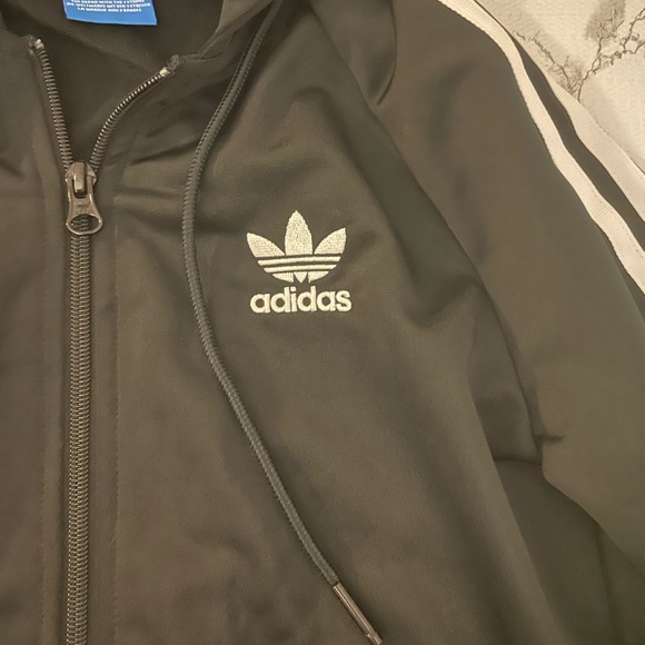 Adidas jacket - classic look with stripes down arms and a hood. Very gently worn - Picture 4 of 4